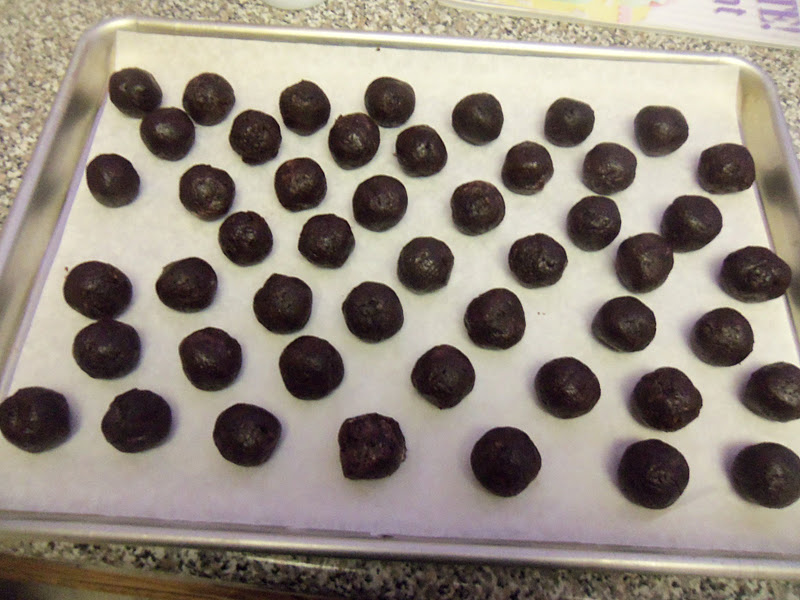 Shape the cake mixture into 40 small cake balls