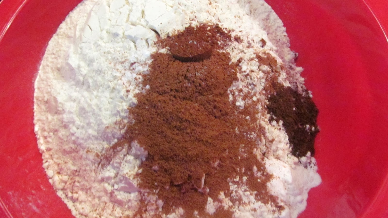 In a bowl, whisk together flour, baking soda, cinnamon, nutmeg, cloves, and salt