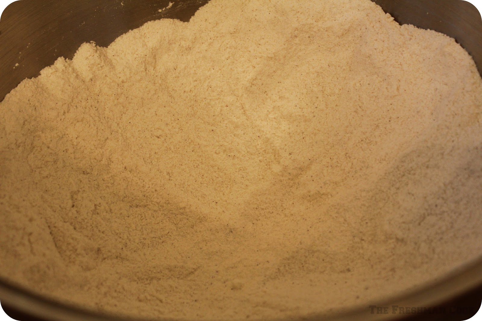 Whisk flour, baking soda, salt, cinnamon, nutmeg, and sugar together in a large bowl