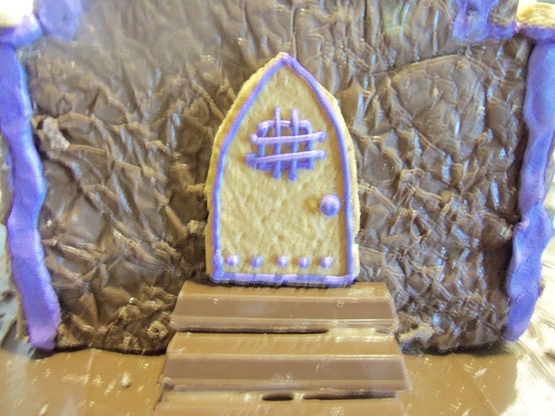 Attach it to the front of the house above the steps