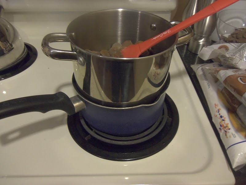 Melt the chocolate candy melts. Use approximately 1½ bags of melted chocolate per cookie sheet