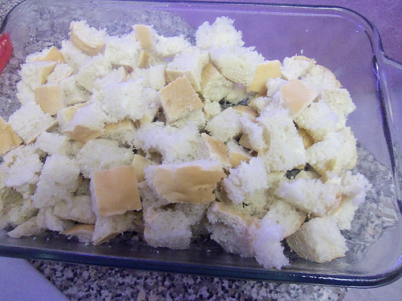 Add cubed bread to the prepared baking dish