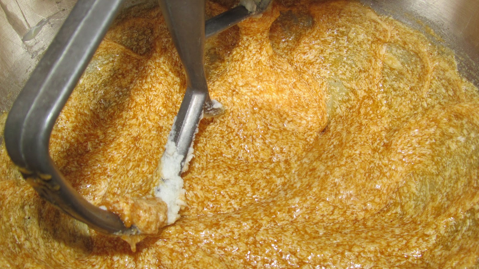 Add pumpkin, egg, vanilla, and water and mix until combined.