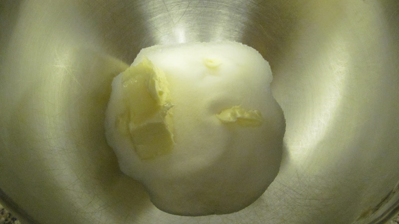 Beat butter and sugar until slightly fluffy