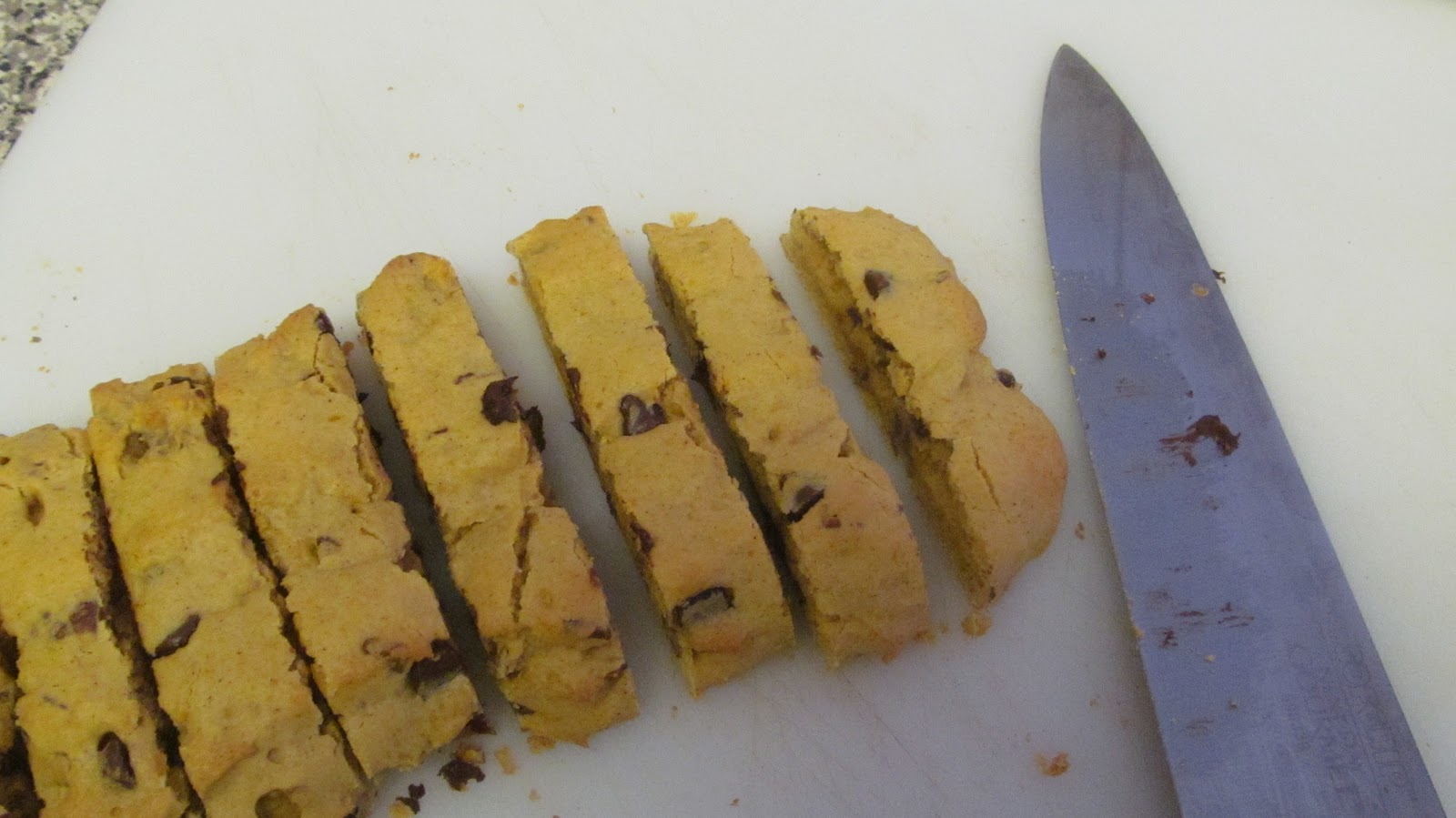 Using a sharp, non-serrated knife, cut each log into 1–1½-inch slices