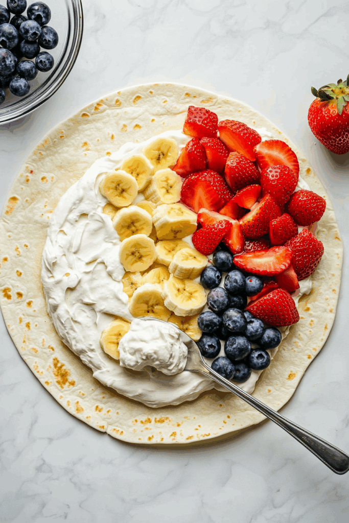 Spread Whipped Cream and Add Fruit