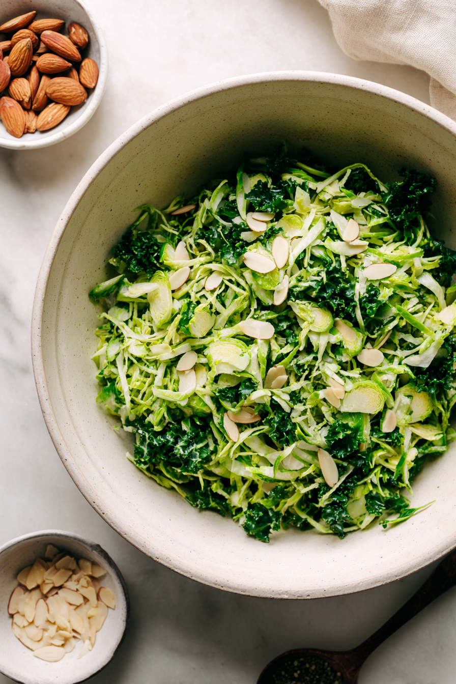Place them in a big basin. Cut the kale thinly into ribbons