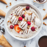 This image shows creamy oat milk ice cream elegantly served in bowls and cones, topped with colorful sprinkles and fruits, showcasing the delightful textures and flavors of this plant-based dessert.