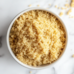 This image shows a bowl of perfectly cooked quinoa prepared in the microwave. The grains are fluffy and tender, making them ideal for a quick meal or side dish.