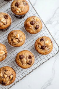 this image shows freshly baked vegan morning glory muffins out of the oven