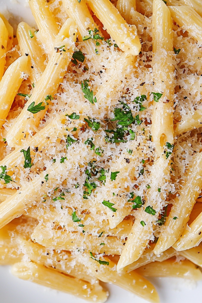 the image shows Creamy-Garlic-Penne-Pasta ready to serve