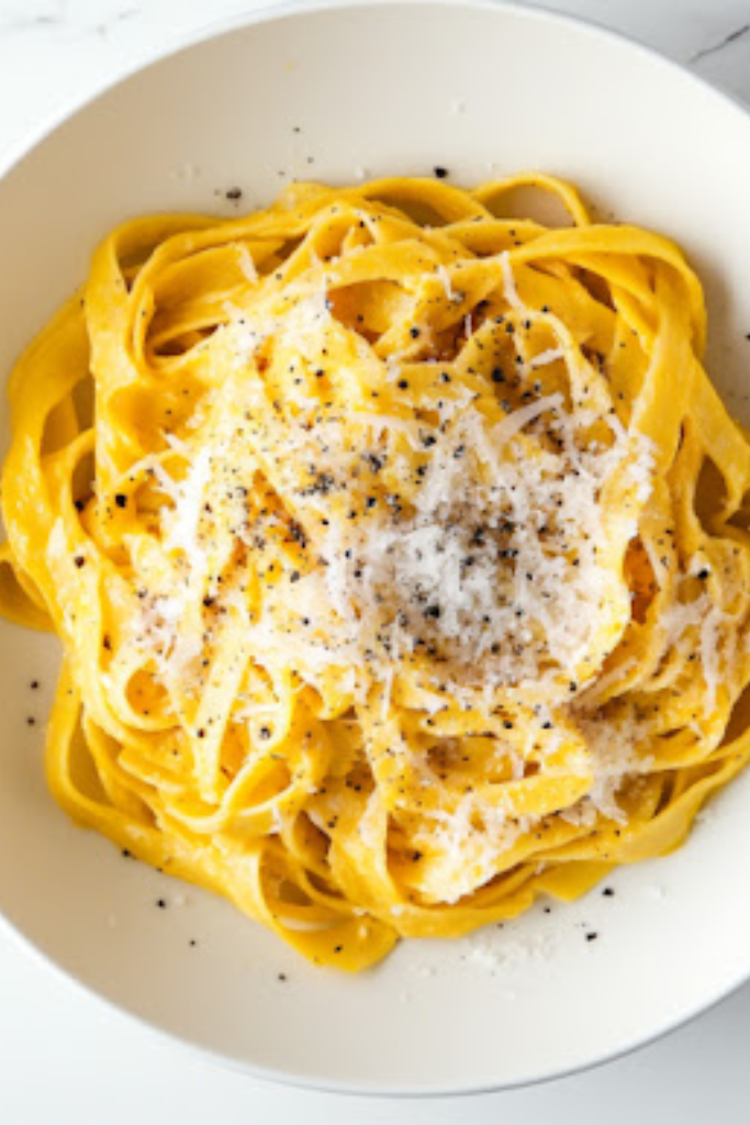 The image shows Pumpkin-Alfredo-Pasta ready to serve