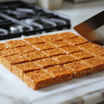 This image shows the Pumpkin Spice Granola Bars, neatly cut and ready to be served.