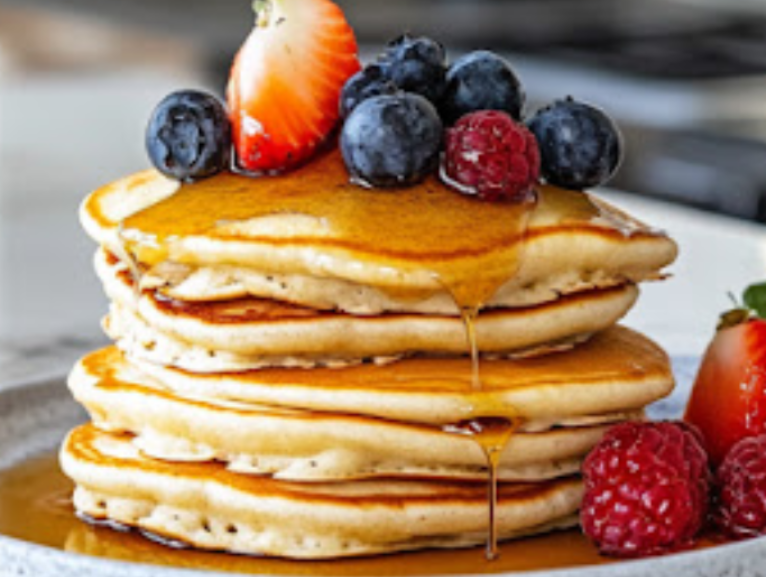 The image shows pumpkin pancakes ready to serve