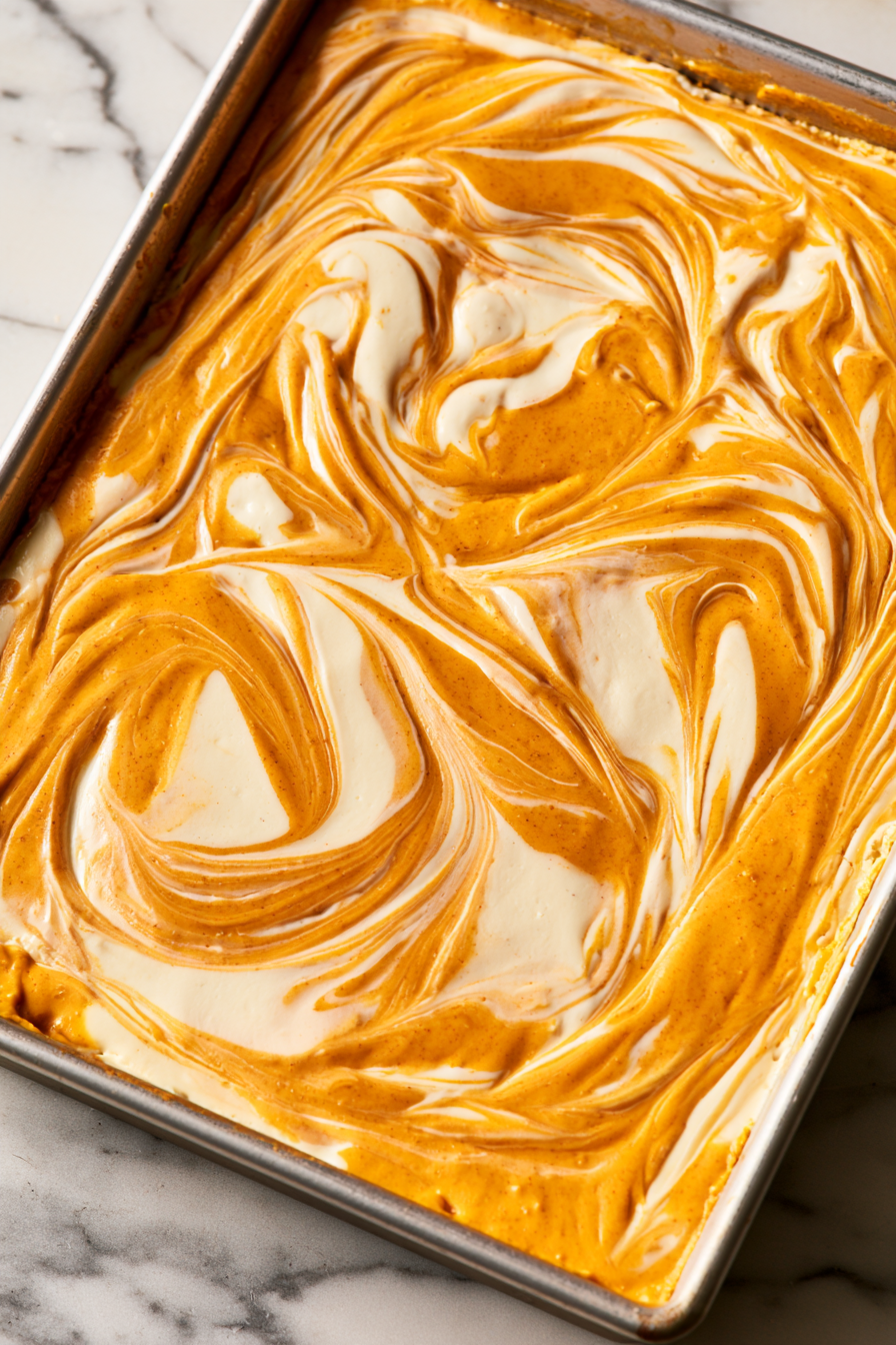 Use a sharp knife to create swirls by dragging through the filling in a figure-eight motion, but avoid reaching down to the crust