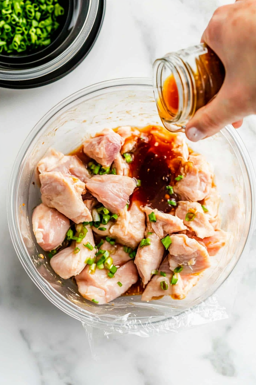 Place chicken pieces in a large zip-top bag or bowl and pour the marinade over them.
