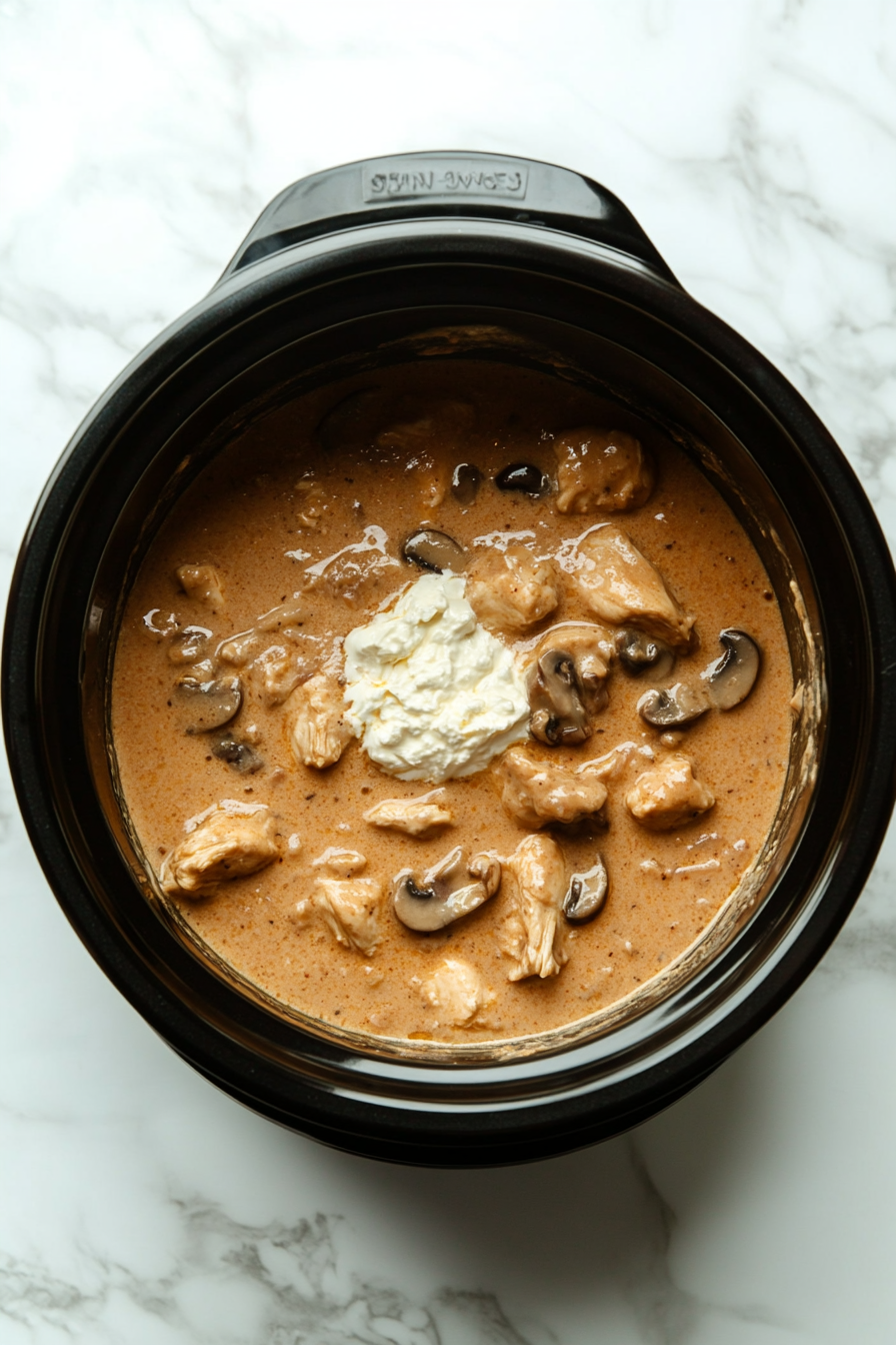 Add this creamy mixture to the Crockpot in the last 30 minutes of cooking.