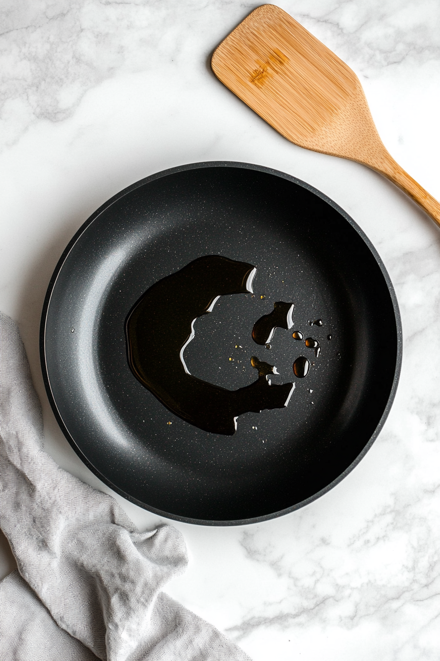 Heat vegetable oil in a large skillet or wok over medium-high heat.