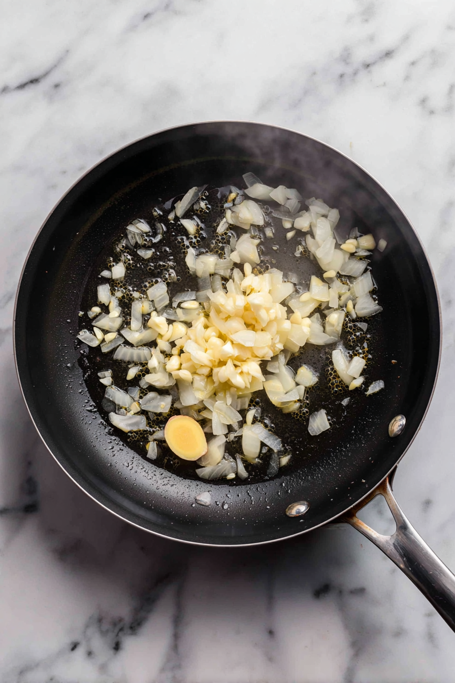 Add garlic and ginger; cook until fragrant.