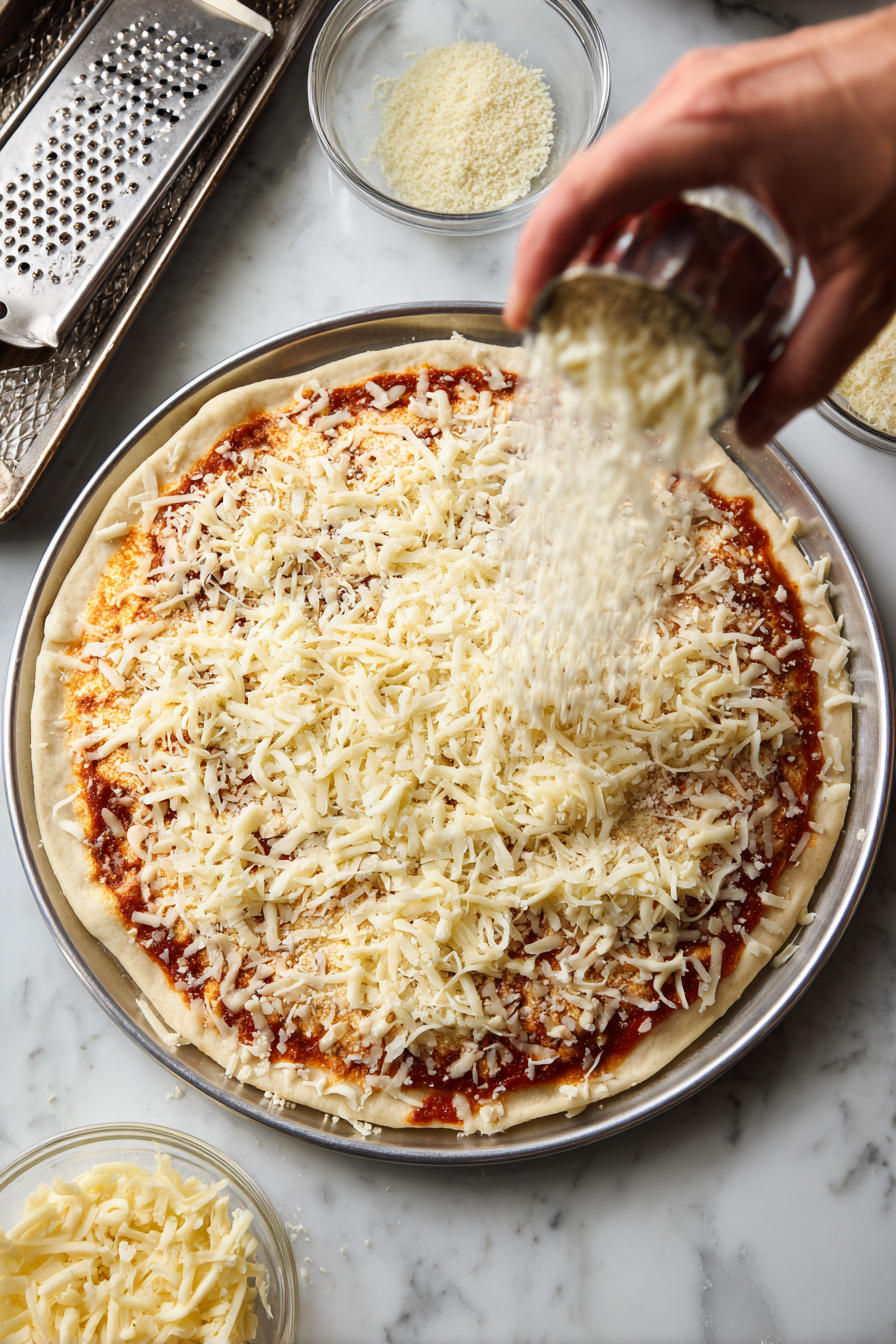 Sprinkle shredded Colby-Jack cheese generously on top.