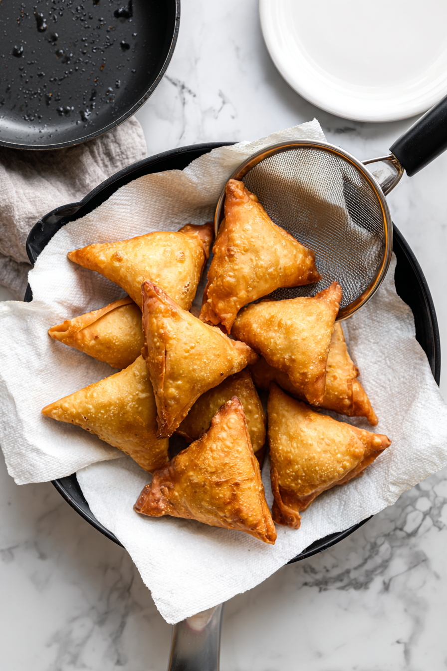 Drain on paper towels and serve hot with chutney or dip.