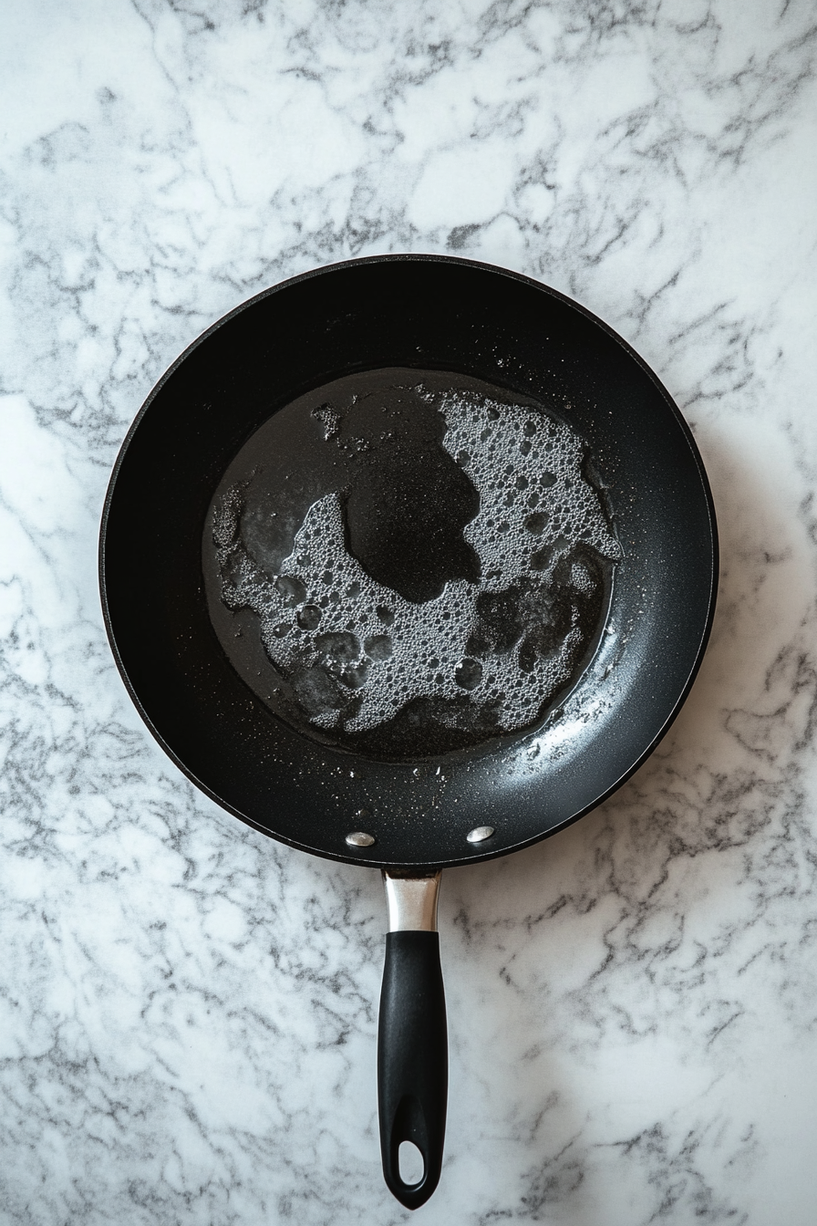 Heat vegetable oil in a deep pan or wok over medium-high heat until hot.