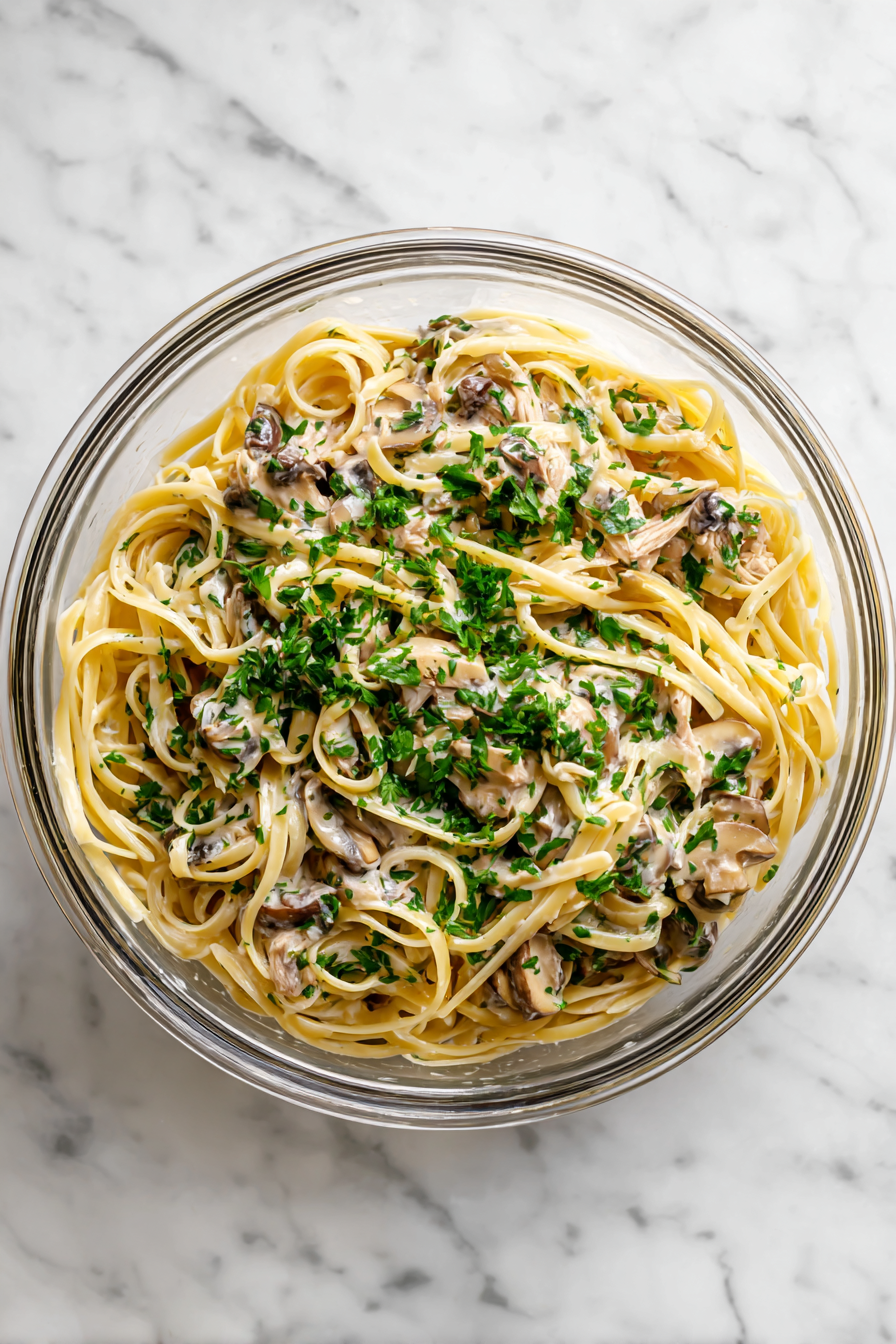 Combine cooked pasta, chicken mixture, and sauce in a large bowl; mix well.