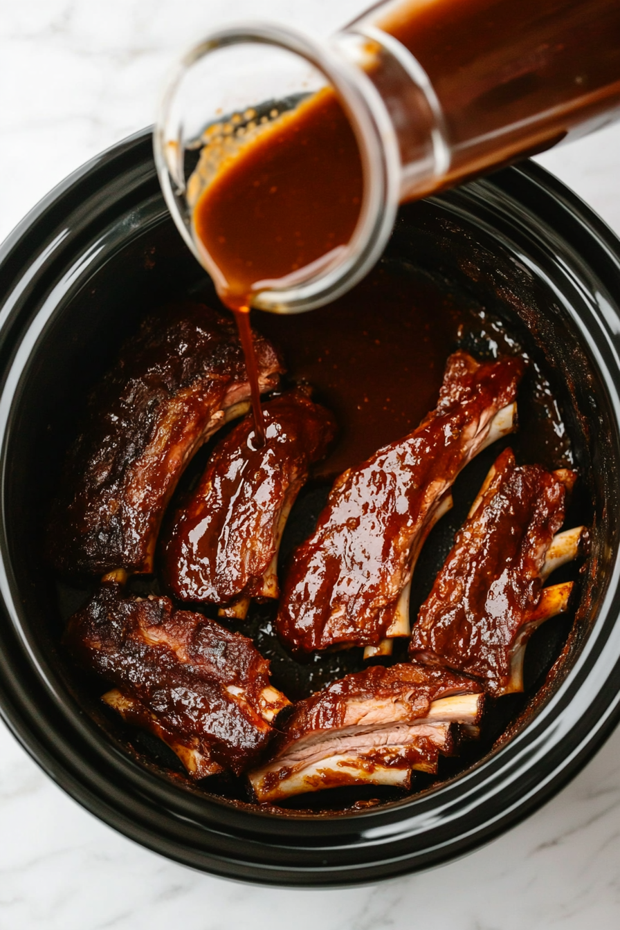 Pour Worcestershire sauce evenly over the ribs.