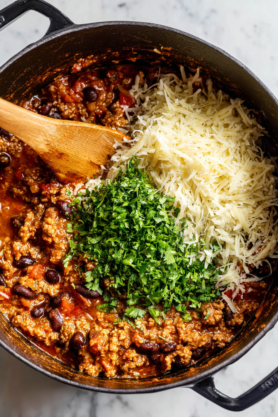 Stir in fresh cilantro and Monterey Jack cheese just before serving.