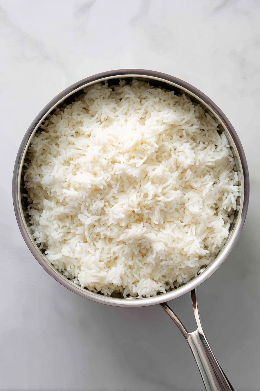 Cook rice according to package instructions; set aside.