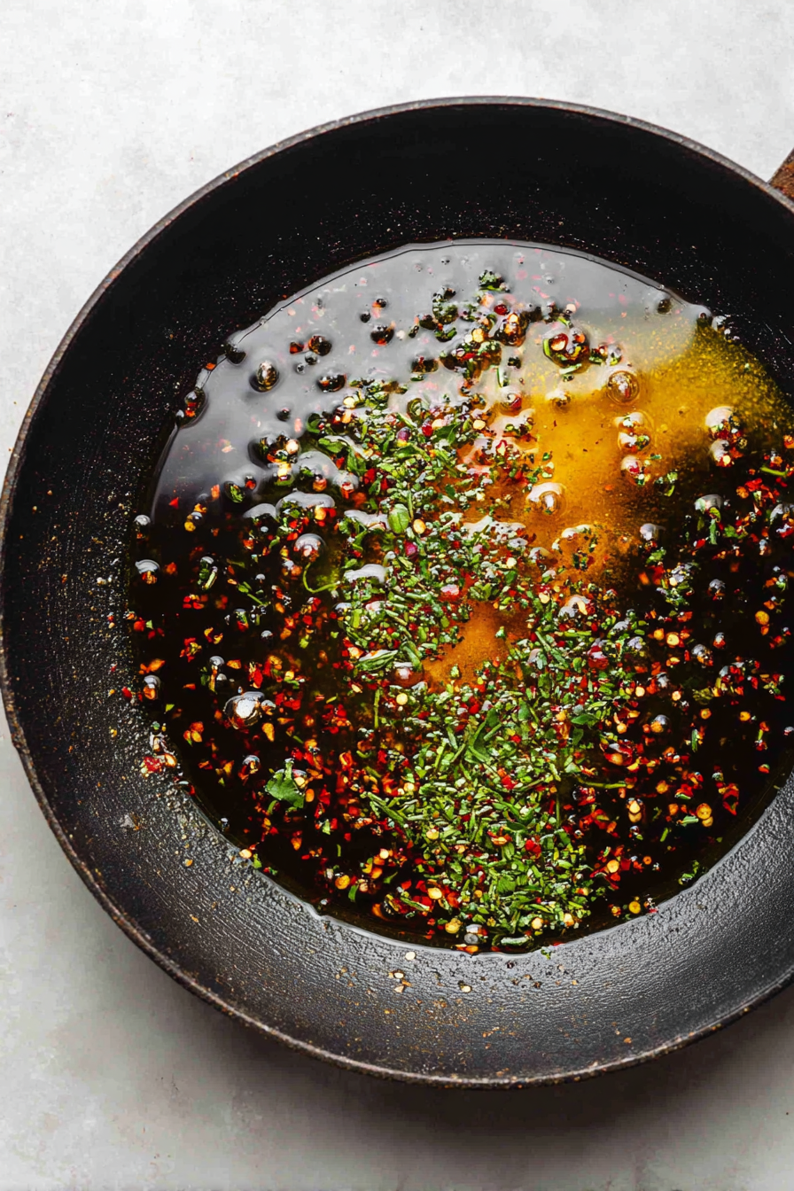 Stir in Kashmiri chili powder and crushed kasuri methi, then turn off the heat.