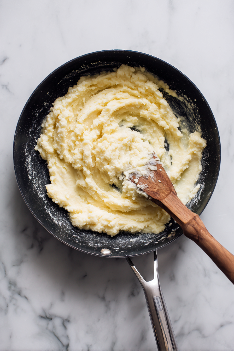 Remove garlic or mash it into the beans (your choice).