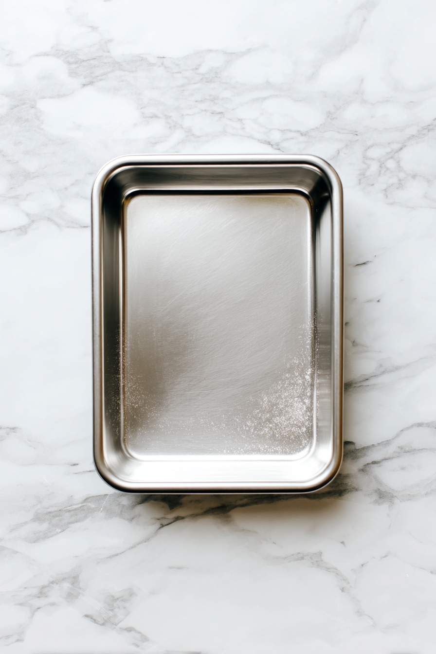 Preheat your oven to 350°F (175°C). Grease and flour your baking pan(s).