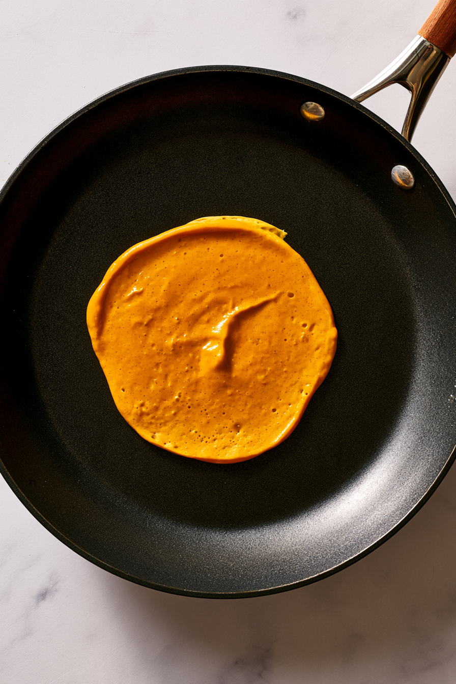 Pour approximately 1/4 cup of batter onto the hot griddle for each pancake, leaving space for spreading