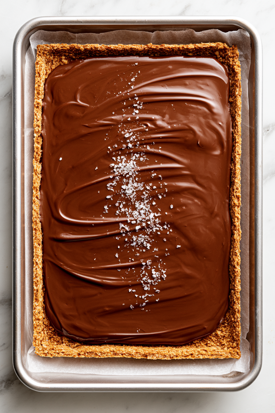 Melt chocolate chips in a microwave-safe bowl at 50% power, stirring every 30 seconds, until smooth